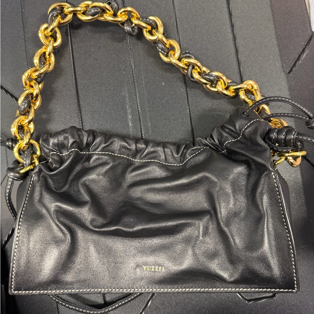 Yuzefi Black Shoulder Bag with Gold Chain Accent